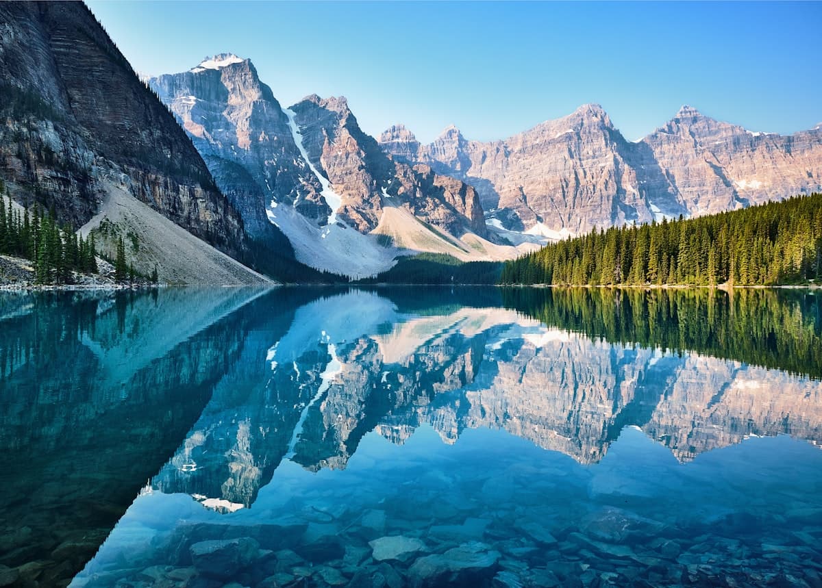 Turquoise alpine lake surrounded by mountains in Banff National Park